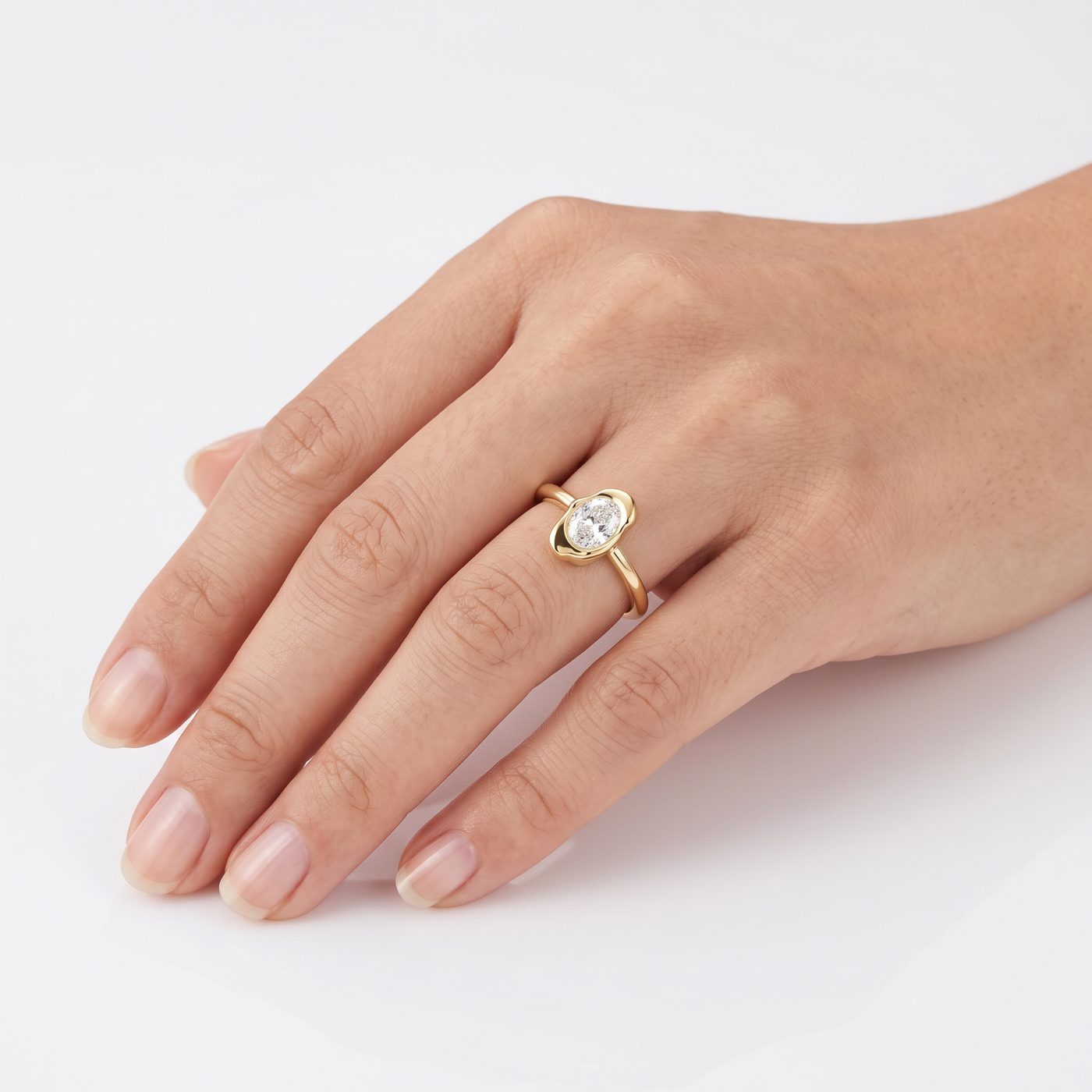 0.40ct Oval Diamond Abstract Bezel Ring