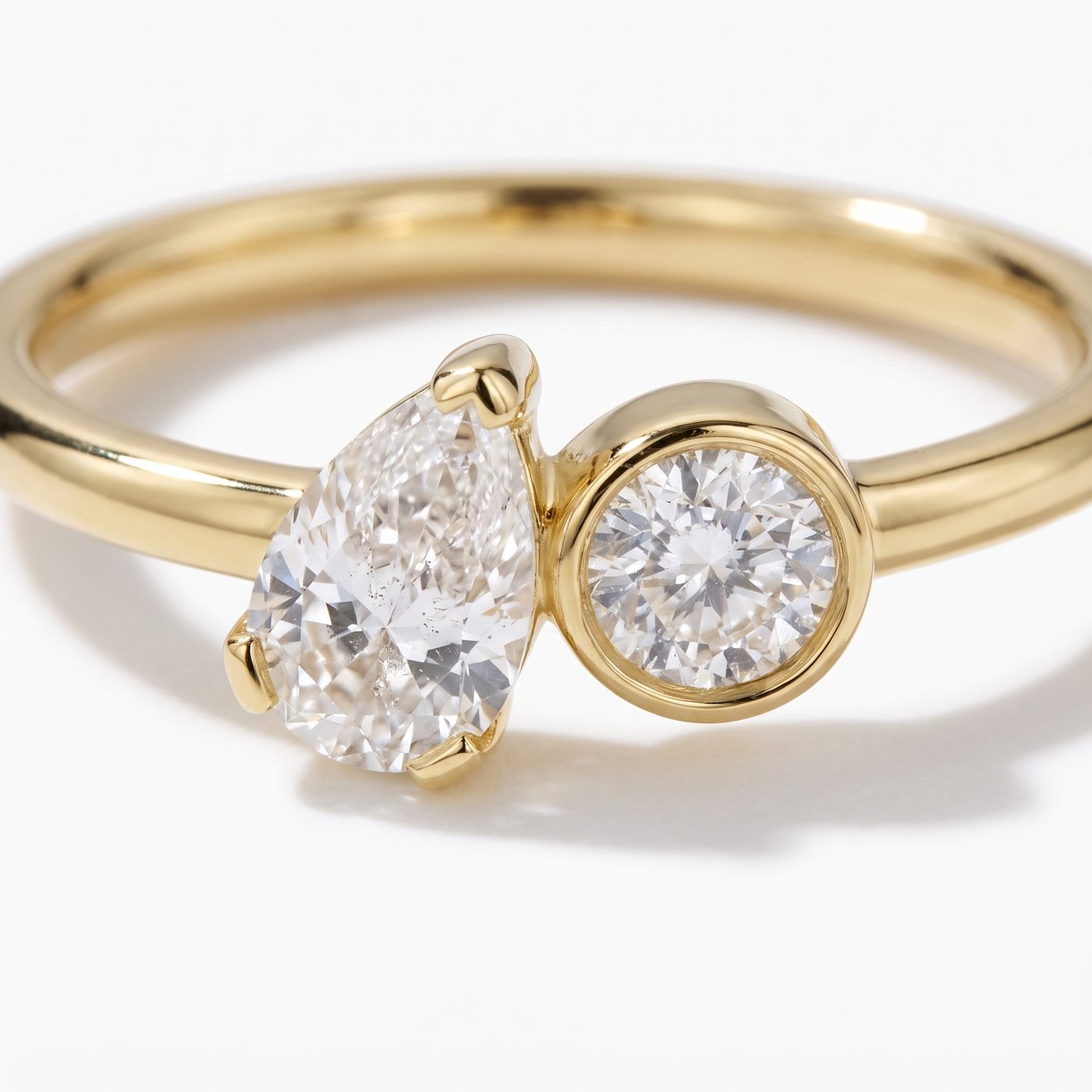 0.48ct Pear Shape Diamond and 0.22ct Round Diamond Toi et Moi